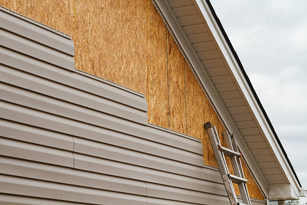 Professional Storm Damage Siding Repair technician working in Lusby, MD